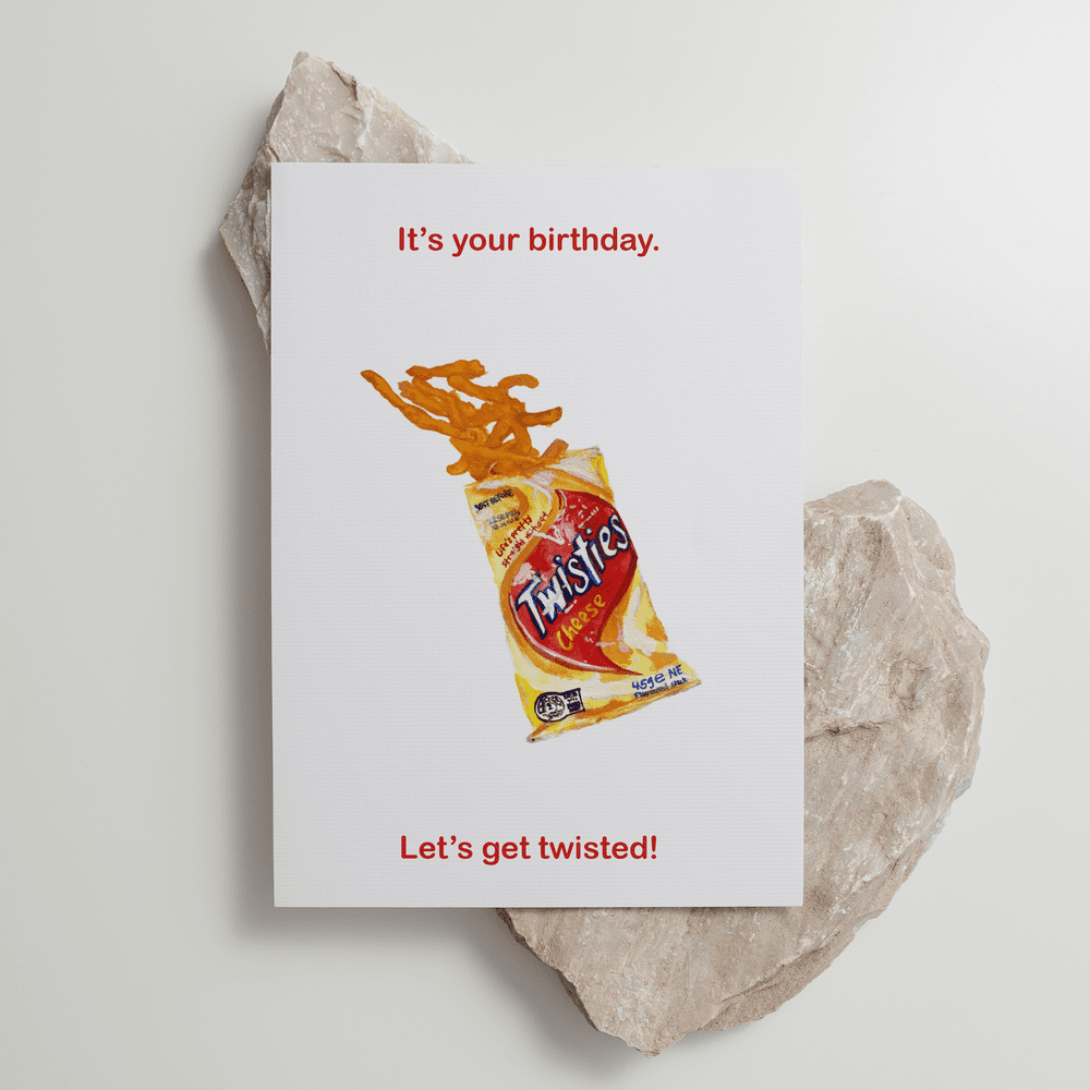 Twisties 'Let's Get Twisted' greeting card flat lay on textured stones