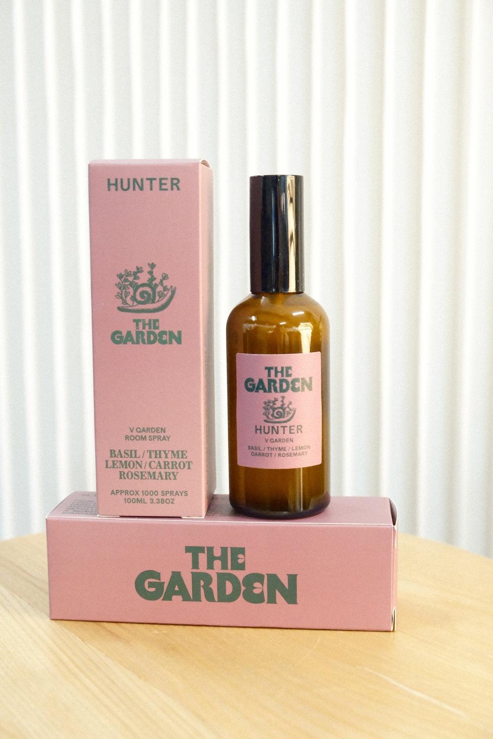 Hunter Candles The Garden room spray in amber glass bottle with pink label