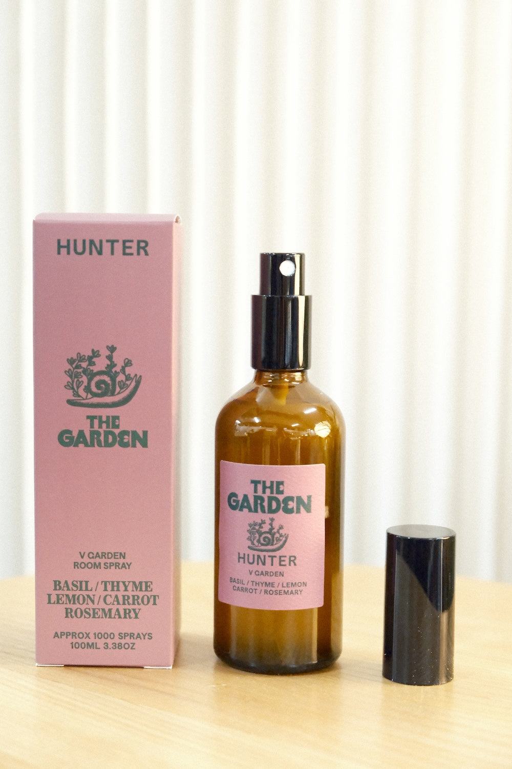 Uncapped Hunter room spray bottle showing black spray nozzle mechanism