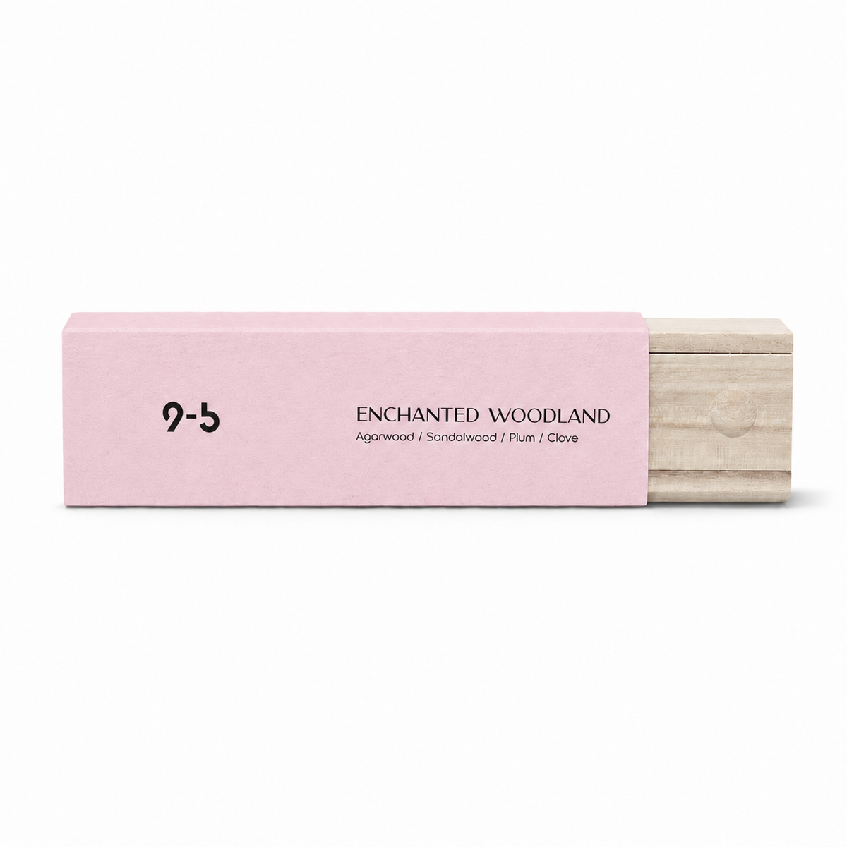 Stack of minimalist incense boxes with wood drawers against green palm leaves