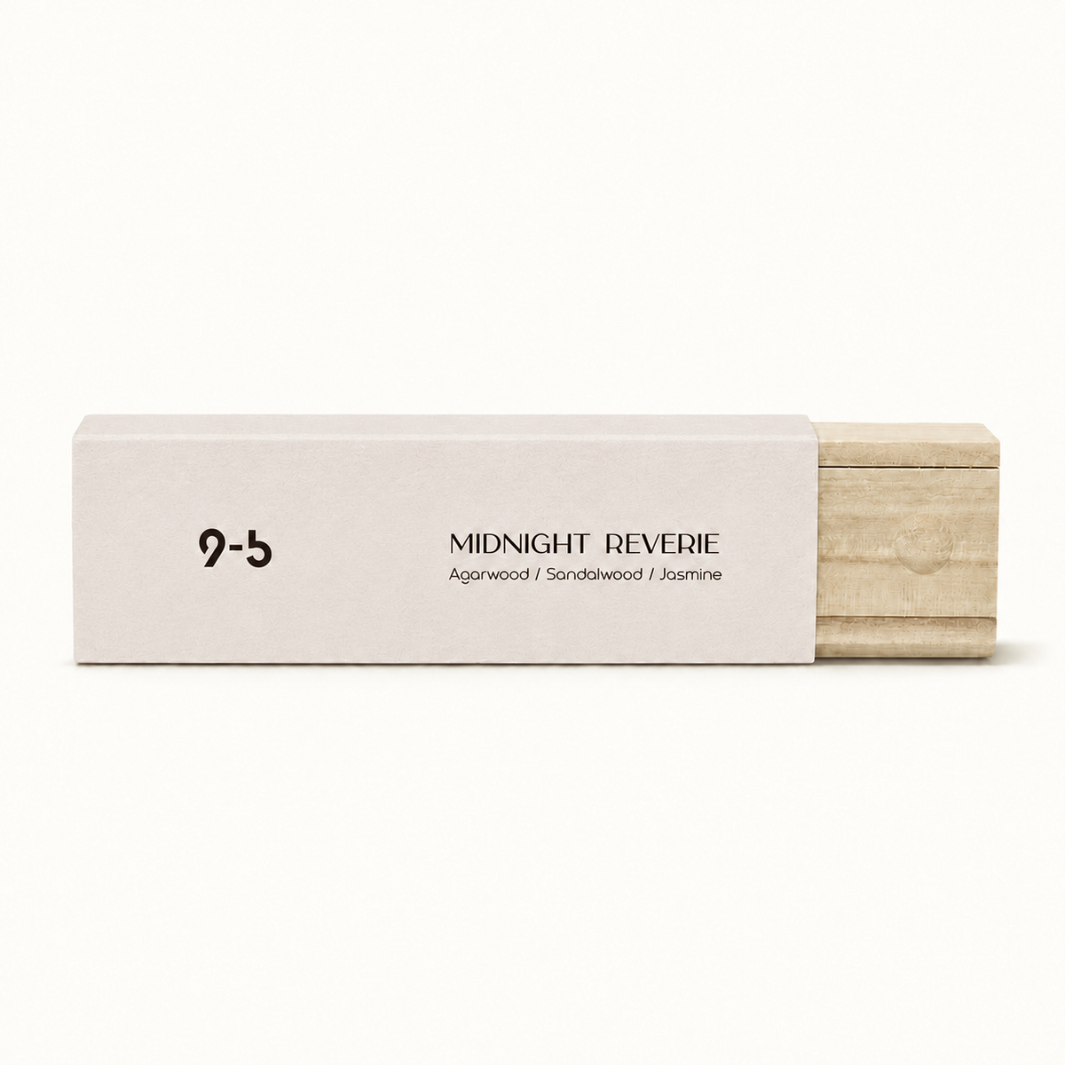 Single off-white Midnight Reverie incense box with sliding natural wood tray and embossed seal on plain background