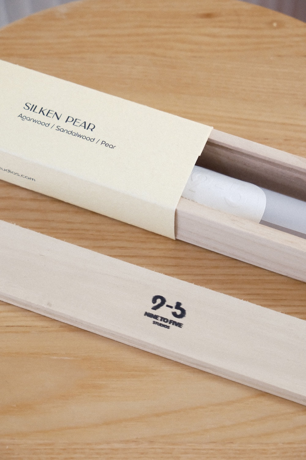 Open Silken Pear incense box revealing wrapped sticks inside