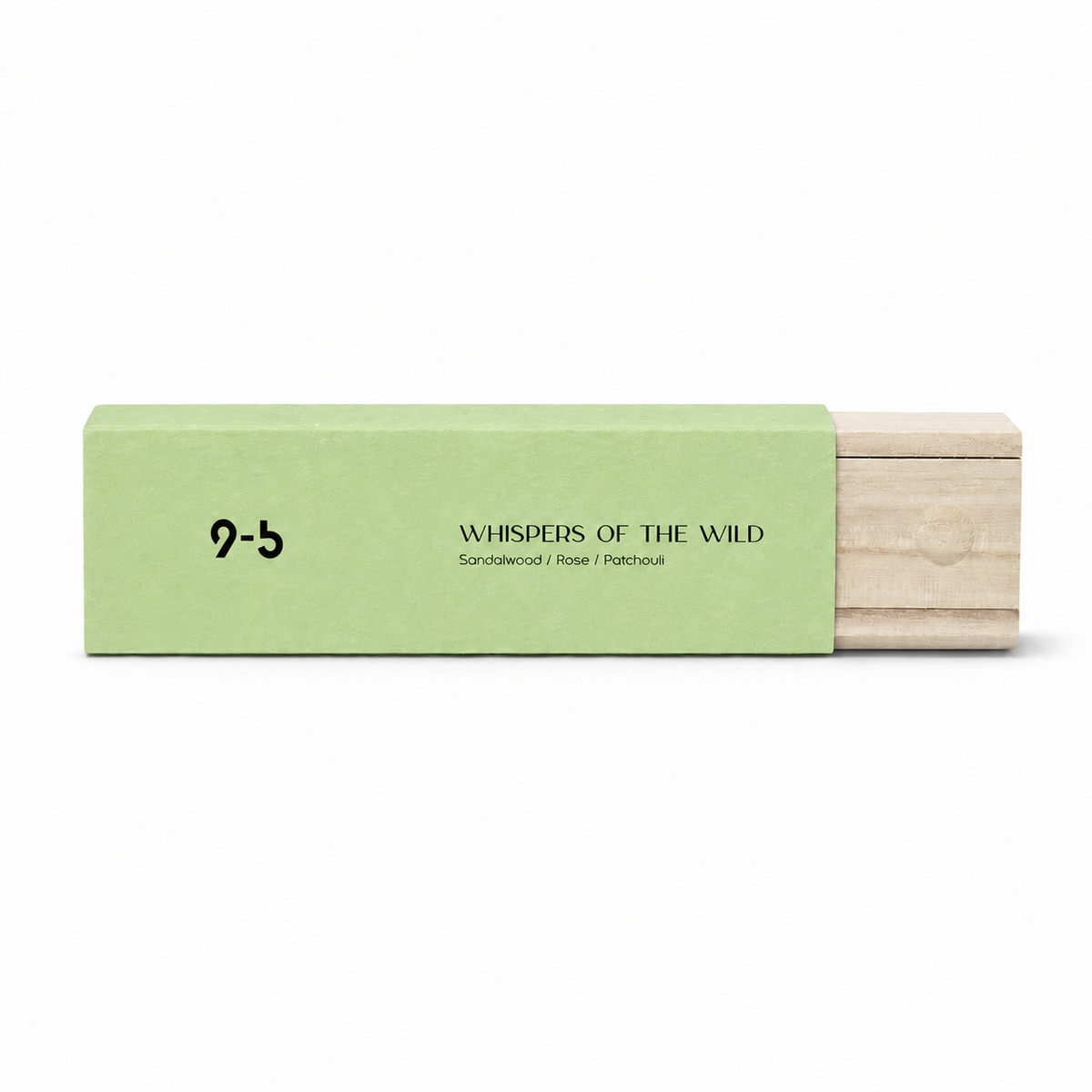 Coral red gift bag behind stack of pastel incense boxes on wooden stool with palm plant