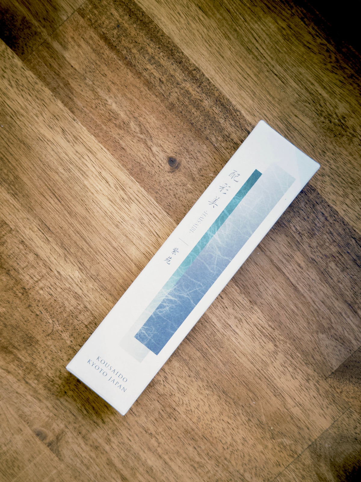 Kousaido Haisaibi Shion incense box on wooden floor by 9to5 Studios