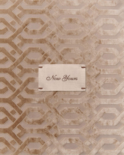 9to5 Studios Odesse Crème Skin 'Now Yours' label on beige velvet fabric