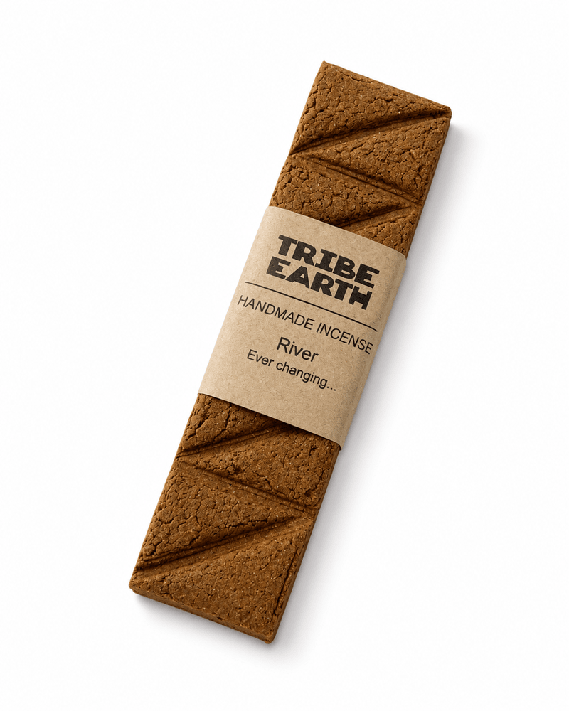 Tribe Earth RIVER Handmade Incense Plank with mixed resins, flowers, and woods burning in a heat resistant dish