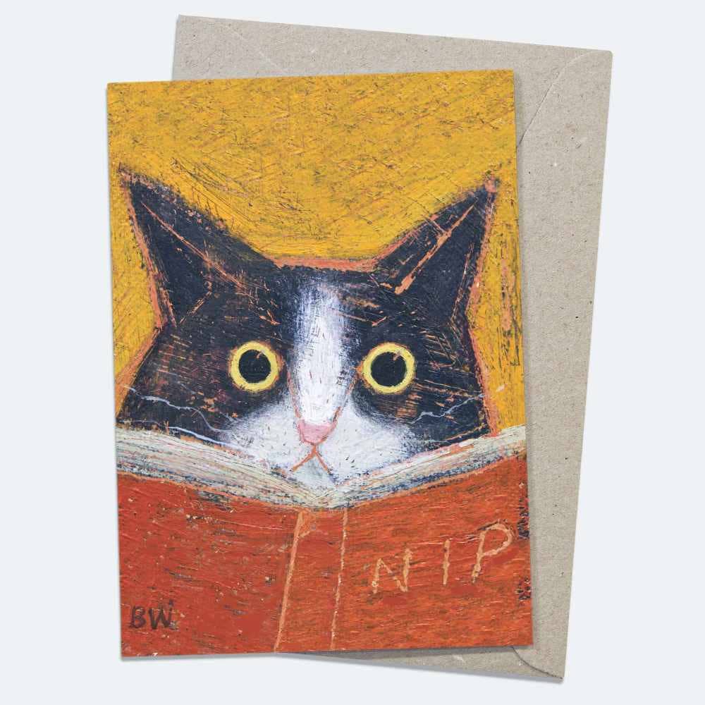 Cat Interrupted greeting card by Beau Wylie at 9to5 Studios featuring black-and-white cat reading red book on mustard background with kraft envelope