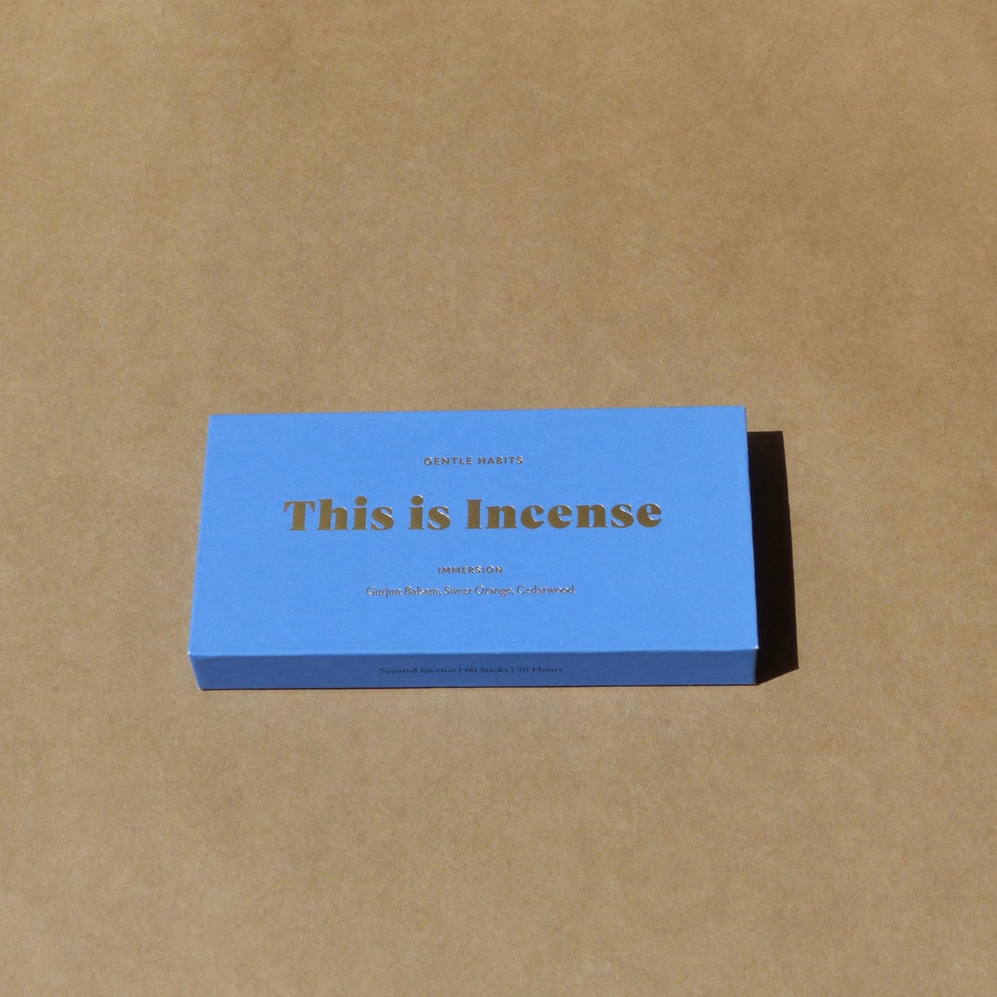 Gentle Habits Immersion incense box matte light blue with gold foil text on kraft paper by 9to5 Studios