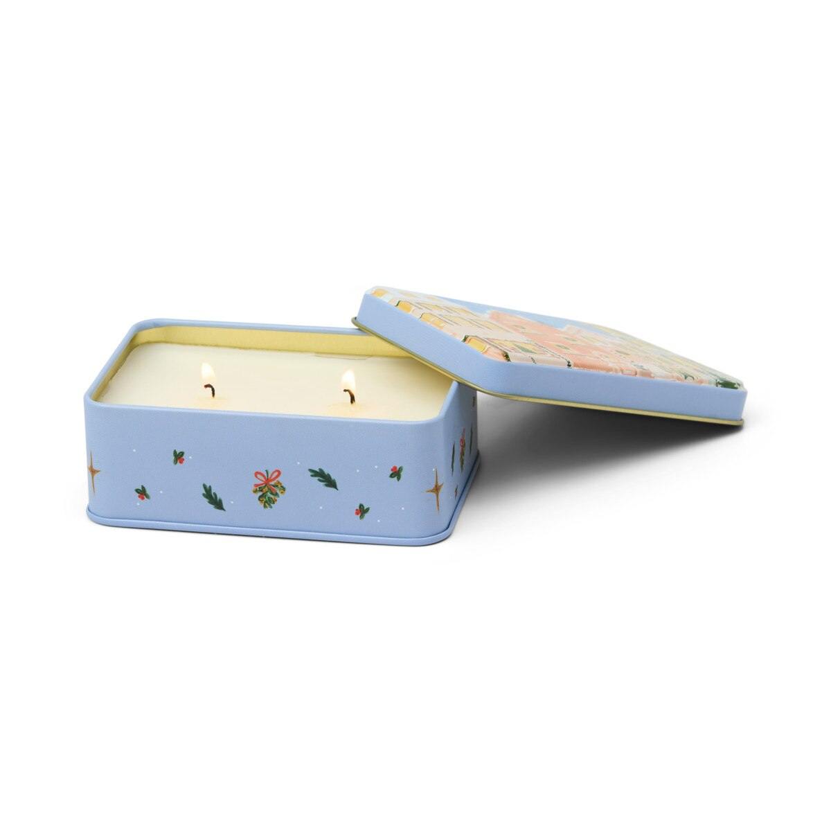 Lit two-wick Paddywax Gingerbread Holiday Tin Candle with soy wax interior by 9to5 Studios
