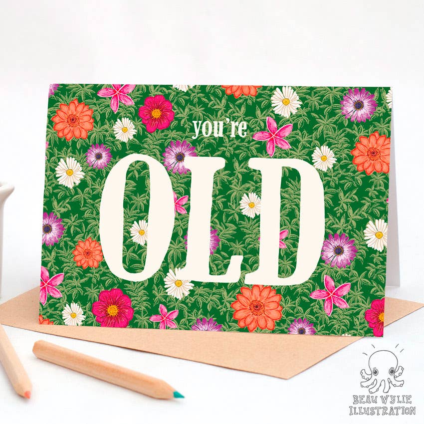 You're Old greeting card by Beau Wylie for 9to5 Studios, A6 floral daisy design on recycled white cardstock with kraft envelope