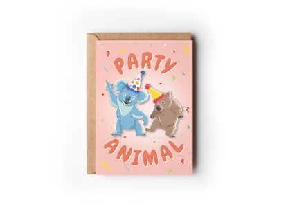 Pink Party Animal greeting card by 9to5 Studios featuring illustrated koala and wombat with party hats