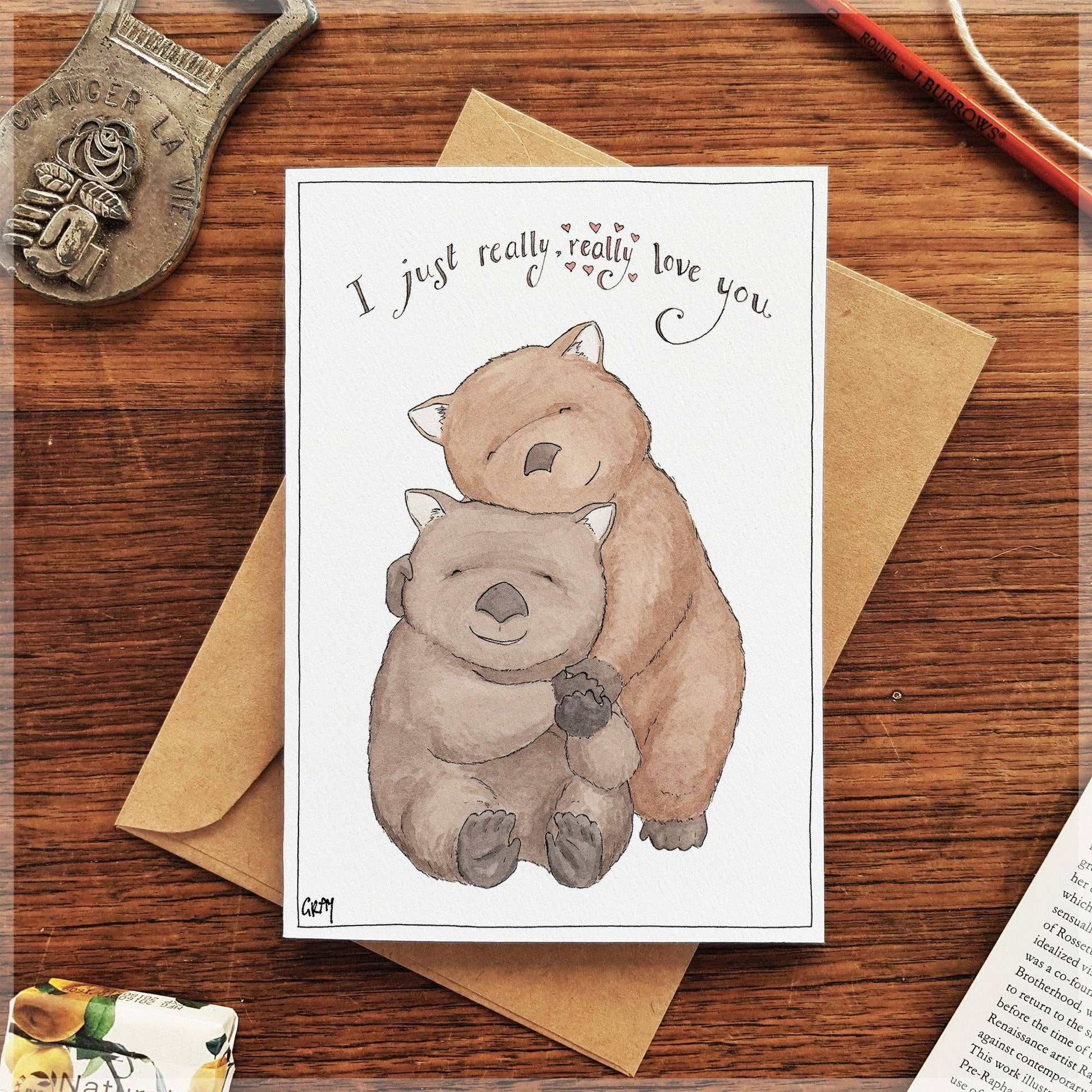 Really Really wombat hug greeting card by Erlenmeyer Art in warm tan and grey watercolour on textured felt paper