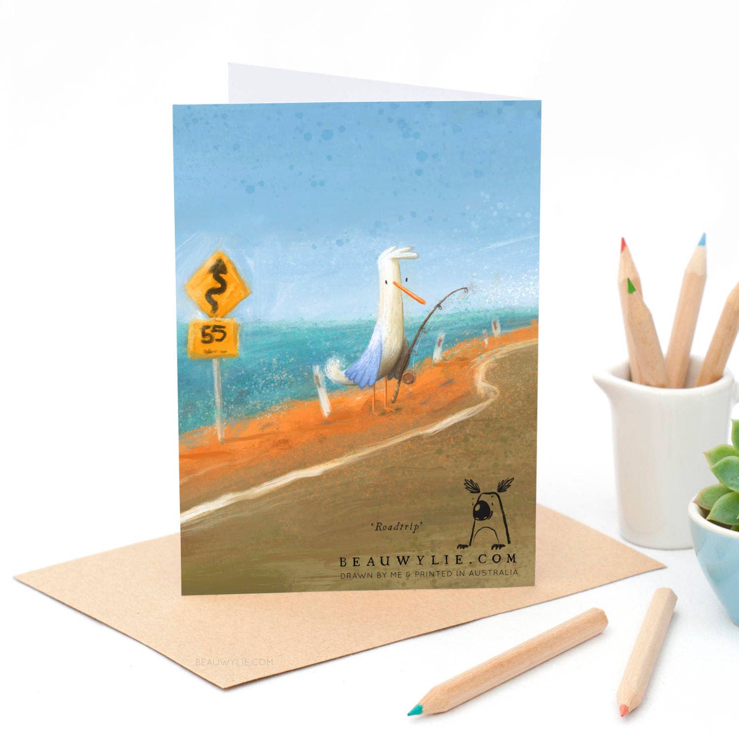 Back of Roadtrip A6 greeting card by Beau Wylie for 9to5 Studios showing seagull fishing scene with Australian coastal theme