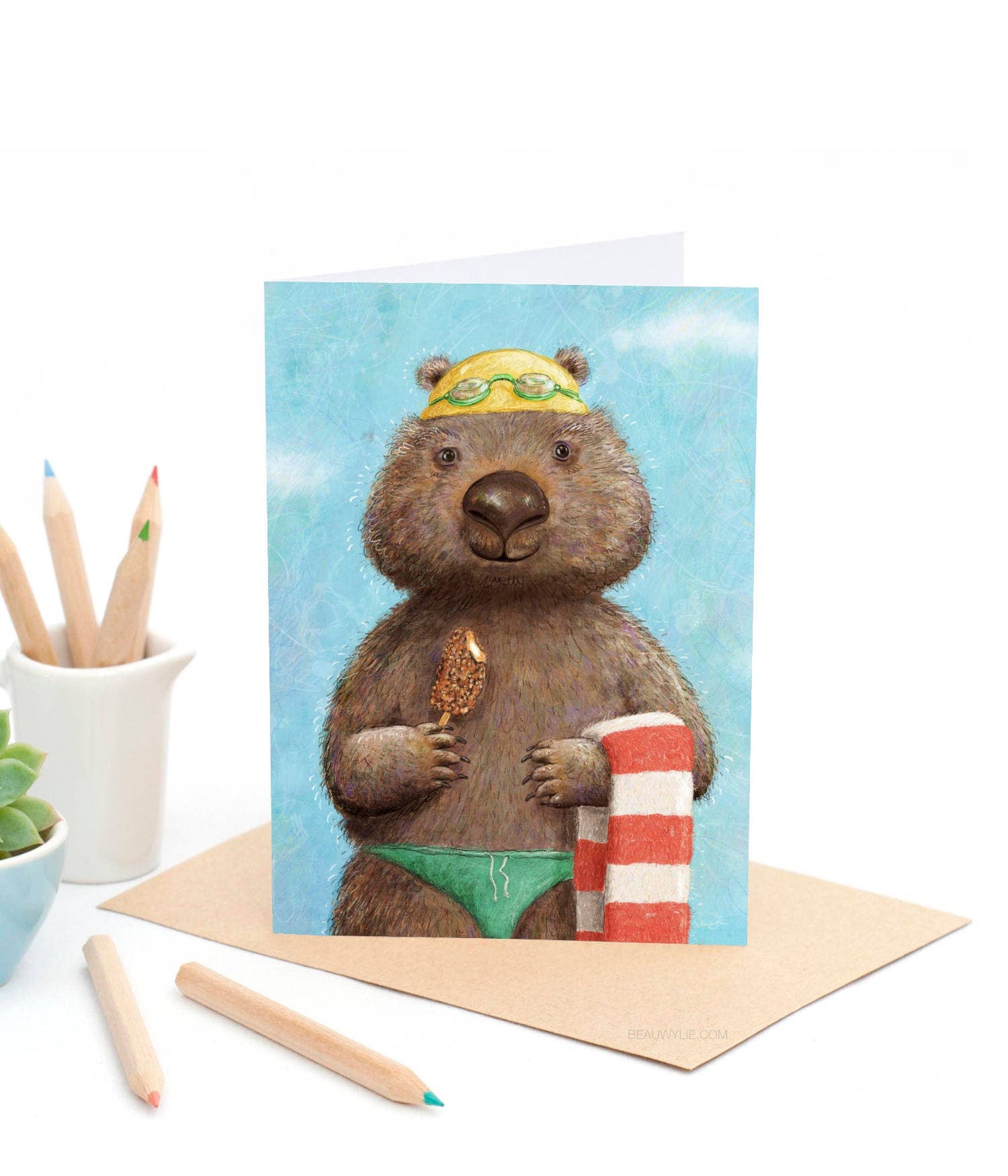 Swimming Club greeting card by Beau Wylie for 9to5 Studios featuring a wombat in swim gear with ice cream on recycled white cardstock